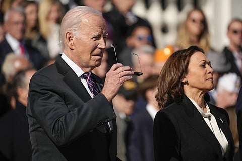 Joe Biden and Kamala Harris arrive for a wreath laying at the Tomb of the Unknown Soldier at Arlington National Cemetery, Saturday, Nov 11, 2023. (Photo | AP)