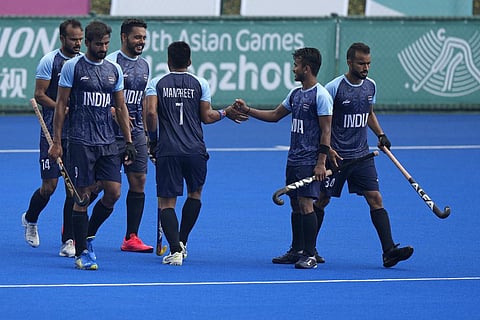 FILE - Indian players celebrate after scoring a goal during the preliminary men's Pool A hockey match against Singapore in the 19th Asian Games in Hangzhou, Sept. 26, 2023. (Photo | AP)