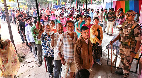 Voters wait in queues at a polling station to cast their votes for the Madhya Pradesh Assembly elections in Jabalpur (Photo | PTI)