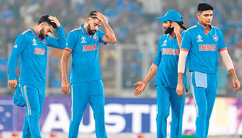 Dejected India players after the loss to Australia in the final of the ODI World Cup in Ahmedabad on Sunday. (Photo | Agencies)