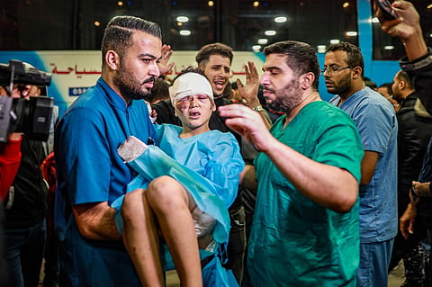 Injured Palestinians evacuated from Indonesian hospital in north of the Gaza Strip receive care at Nasser hospital in the Palestinian territory's southern city of Khan Yunis, on Nov 20, 2023. (AFP)