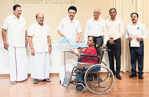 Chief Minister MK Stalin gave away orders allocating houses to disabled people on Monday | Express