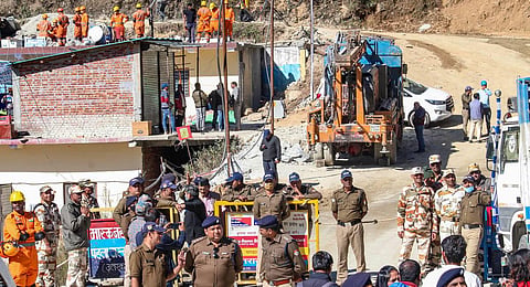 Rescue and relief operation underway after a portion of a tunnel under construction between Silkyara and Dandalgao collapsed, in Uttarkashi district. (Photo | PTI)