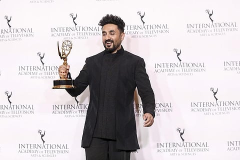 Vir Das poses in the press room with the Emmy for Best Comedy at the 51st International Emmy Awards at the New York Hilton Midtown on Nov. 20, 2023, in New York. (AP)