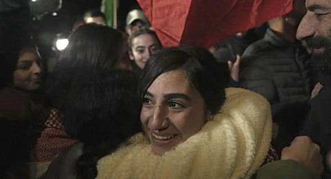 Palestinian prisoner Ruba Assi is greeted after she was released, in the West Bank town of Ramallah. (Photo | AP)