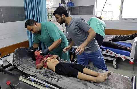 A wounded Palestinian girl receives treatment at Kama Adwan hospital following Israeli bombardment on a UN school used as shelter in Jabaliya, Thursday, Nov 2, 2023. (Photo | AP)