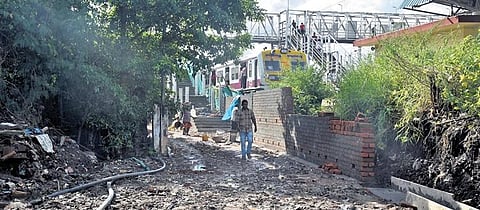 The pathway leading to Vyasarpadi Jeeva railway station lying in shambles | Martin Louis
