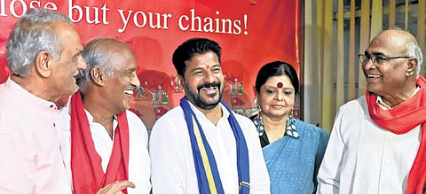 TPCC chief A Revanth Reddy shares a light moment with CPI leaders at Makdoom Bhavan on Monday | Vinay Madapu