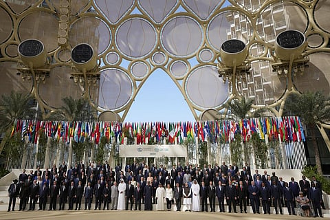 World leaders pose for a group photos at the COP28 U.N. Climate Summit, Friday, Dec. 1, 2023, in Dubai, United Arab Emirates. (Photo | AP)
