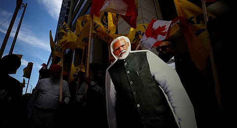 FILE - Protestors hold a cutout of PM Narendra Modi during a Sikh rally outside Indian consulate in Toronto over India's alleged role in separatist Hardeep Nijjar's killing, Sept 25, 2023. (AFP Photo)