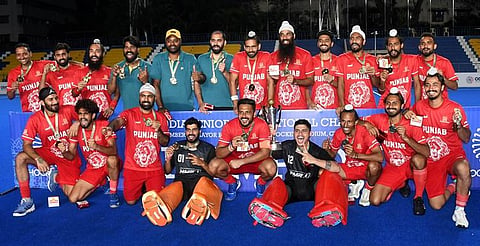 Pathak (R) celebrating winning the final with captain Harmanpreet Singh. (Photo | D Sampathkumar, EPS)