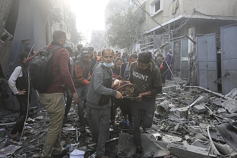 Palestinians evacuate wounded in Israeli bombardment Rafah, Gaza Strip. (Photo | AP)