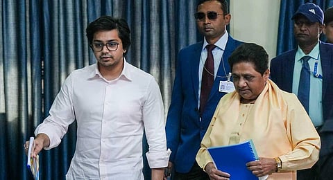 BSP supremo Mayawati with her nephew Akash Anand arrives for a meeting of party's office bearers ahead of the 2024 Lok Sabha elections, at the party office in Lucknow, Sunday, Dec. 10, 2023. (PTI )