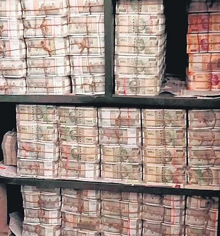 File photo of cash seized during I-T raids at the distillery group and linked entities in Odisha.
