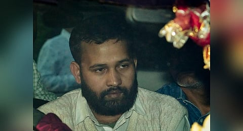 Lalit Jha, key accused in the recent Parliament security breach, being produced at the Patiala House Court, in New Delhi on Friday, December 15, 2023. (Photo | PTI)