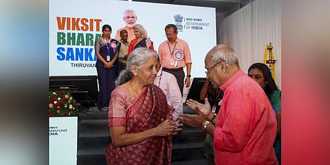 Union Finance Minister Nirmala Sitharaman interacts with veteran BJP leader O Rajagopal during the 'Viksit Bharat Sankalp Yatra', in Thiruvanathapuram. (Photo | PTI)