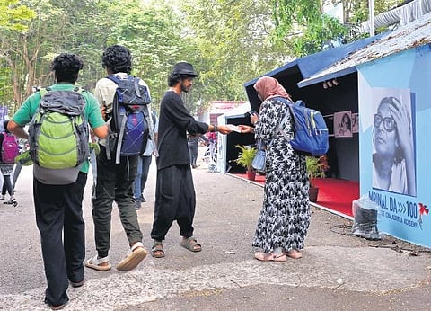 Delegates were seen carrying luggage on the final day of the International Film Festival of Kerala at Tagore Theatre - the main venue of the festival. (Photo | BP Deepu, EPS)