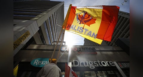 Demonstrators gather in support of Khalistan during a Sikh rally outside the Consulate General of India, in Toronto.
