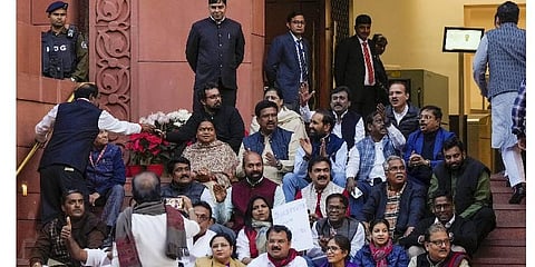 Suspended Opposition MPs protest during the Winter session of Parliament, in New Delhi. (Photo | PTI)