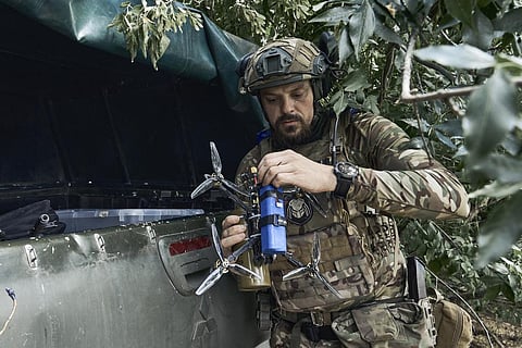 A Ukrainian soldier prepares a drone on the frontline in the Zaporizhzhia region, Ukraine, Saturday, July 1, 2023. (Photo |AP)