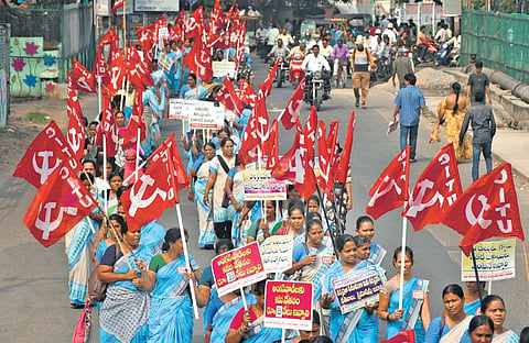 Anganwadi workers and helpers take out a protest rally from the Railway Station to Dharna Chowk in Vijayawada on Monday. (Photo I Prasant Madugula, EPS)