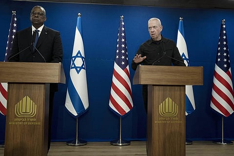 Israel Minister of Defense Yoav Gallant (R), speaks during a joint statement with his US counterpart, Secretary of Defense Lloyd Austin in Tel Aviv, Israel, Monday, Dec. 18, 2023. (AP Photo)
