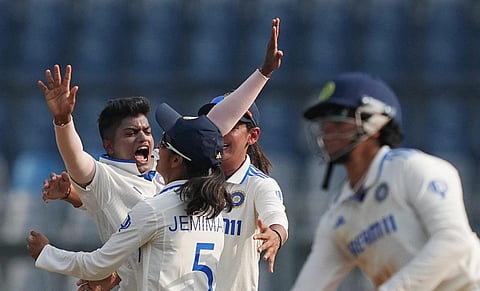 India's bowler Pooja Vastrakar celebrates the wicket of Australian batter Ellyse Perry during the first day of the one-off Test cricket match between India and Australia. (Photo | PTI)