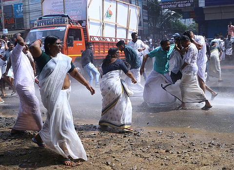 Women Congress activists hurl stones at the police during the Congress protest march led by KPCC president K Sudhakaran in Thiruvananthapuram on December 23, 2023