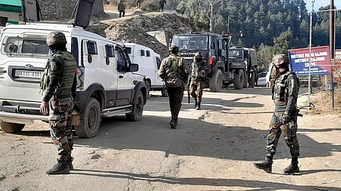 Security personnel during a cordon and search operation near the site where Army vehicles were ambushed by terrorists on Thursday, in Poonch district, Friday, Dec. 22, 2023. (PTI Photo)