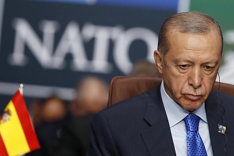 Turkish President Recep Tayyip Erdogan waits for the start of a round table meeting of the North Atlantic Council during a NATO summit in Vilnius, Lithuania. (Photo | AP)
