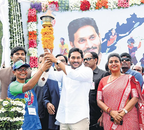 Chief Minister YS Jagan Mohan Reddy takes part in the inaugural event of the Aadudam Andhra programme at Nallapadu in Guntur district on Tuesday I Express