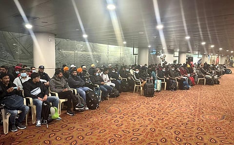 Passengers of a charter plane, which was grounded in France for four days over suspected human trafficking, arrive in Mumbai. (File photo | PTI)