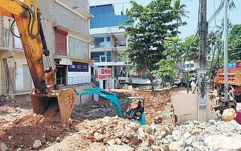 The demolition of buildings in progress at Sreekaryam junction as part of the construction of the flyover | B P Deepu