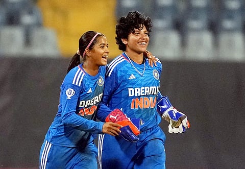 Caption: Shreyanka Patil (L) took two wickets on her T20I debut vs England | PTI