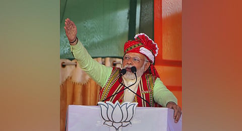: Prime Minister Narendra Modi addresses during a 'Vijay Sankalp Rally' for the upcoming Tripura Assembly elections (Photo | PTI)