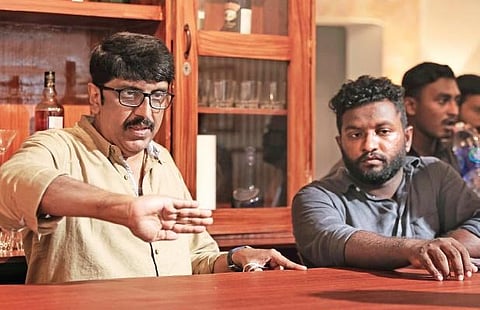 Unnikrishnan B with cinematographer Faiz Siddik