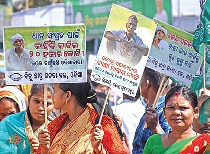 BJD workers on three-day state-wide protest against deduction of paddy allocation by the Centre, in Bhubaneswar on Tuesday | express