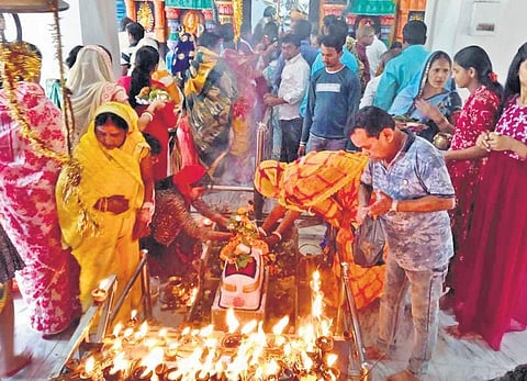 Devotees lighting earthen lamps in Vedvyas temple in Rourkela