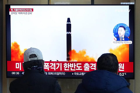 A TV screen shows a file image of North Korea's missile launch during a news program at a railway station in Seoul, South Korea, Monday, Feb. 20, 2023. (Photo | AP)