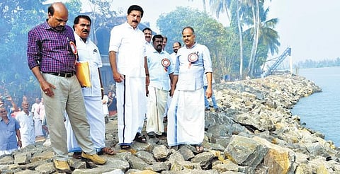 Water Resources Minister Roshy Augustine visits the reconstructed sea wall at Azheekkal coast in Kannur. MLA K V Sumesh is also seen