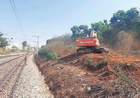 A double-decker structure is being planned with the flyover on one level and the railway line above it | Express