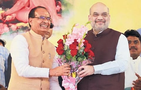 Union home minister Amit Shah and CM Shivraj Singh Chouhan in Satna district of Madhya Pradesh on Friday.