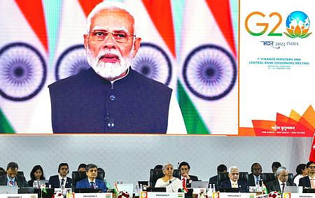 PM Narendra Modi addresses a G20 meeting via video conference | Express
