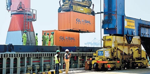 Workers load empty freight containers on container vessel Hope Seven at the DP World Container Terminal in Chennai on Monday | Ashwin prasath