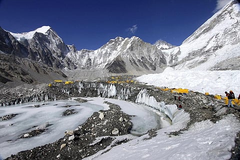 Tents are set up for climbers on the Khumbu Glacier, with Mount Khumbutse, center, and Khumbu Icefall, right, seen in background, at Everest Base Camp in Nepal on April 11, 2015. (File Photo | AP)