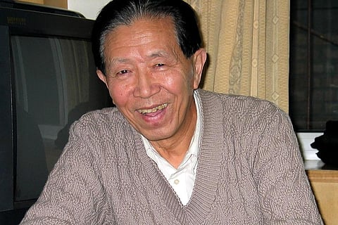 Military surgeon Jiang Yanyong is seen in a hotel room in Beijing. (File Photo | AP)
