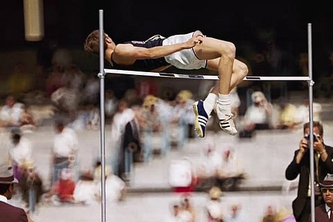 FILE - Dick Fosbury, of the United States, clears the bar in the high jump competition at the 1968 Mexico City Olympics. (Photo | AP)