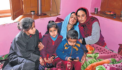 Family members of Sanjay Sharma, who was shot dead by militants on Sunday in Achan village in Pulwama, urged the government to provide them accommodation in Jammu, on Wednesday | Zahoor punjabi