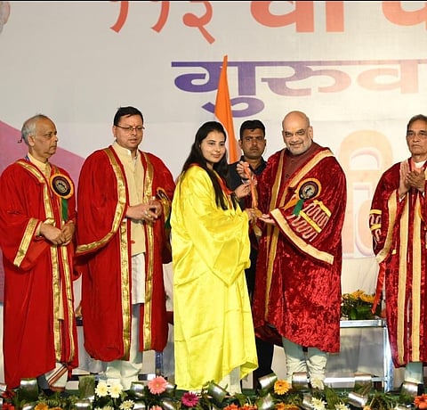 Amit Shah awarded degrees and gold medals to students at the 113th convocation of Gurukul Kangri University in Haridwar on March 30, 2023. (Photo | EPS)