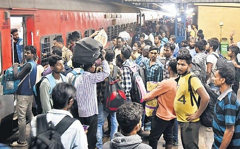 Ahead of Holi, migrant workers throng MGR Chennai Central station to board trains to North India on Monday evening | P Jawahar